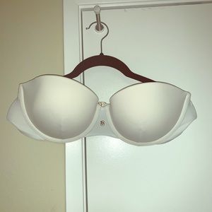 Women’s white bandeau bikini top.